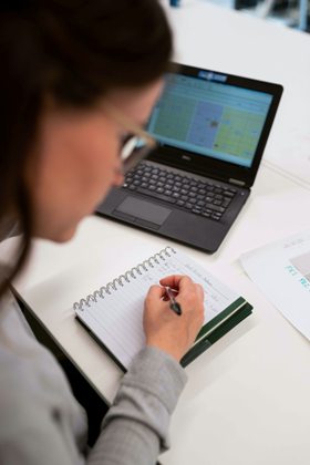 Woman taking notes